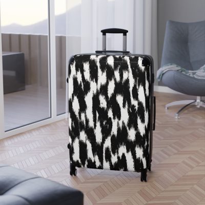 Cowhide Suitcase - A stylish luggage featuring a chic cowhide design, perfect for travelers who want to add a touch of luxury to their journeys