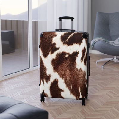 Cowhide Suitcase - A stylish luggage featuring a chic cowhide design, perfect for travelers who want to add a touch of luxury to their journeys