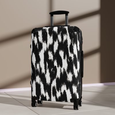 Cowhide Suitcase - A stylish luggage featuring a chic cowhide design, perfect for travelers who want to add a touch of luxury to their journeys