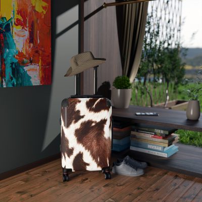 Cowhide Suitcase - A stylish luggage featuring a chic cowhide design, perfect for travelers who want to add a touch of luxury to their journeys