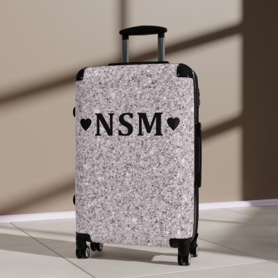 Custom Glitter Suitcase - A personalized travel essential that sparkles with individuality.