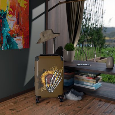 Sunflower Skull Suitcase - A trendy and edgy travel accessory featuring a stylish blend of skulls and sunflowers.