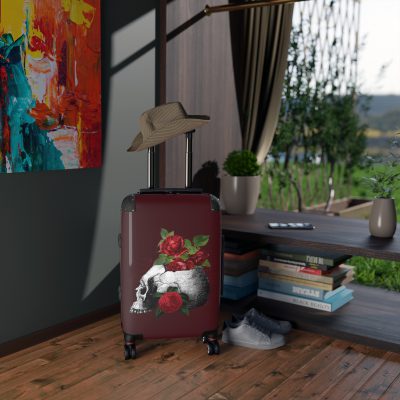 Red Floral Skulls Suitcase - A striking travel companion featuring a vibrant red floral pattern intertwined with bold skulls for a daring and stylish look.