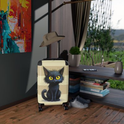 Black Cat Suitcase - A stylish travel companion featuring a sleek black design adorned with charming cat illustrations for a touch of whimsy.