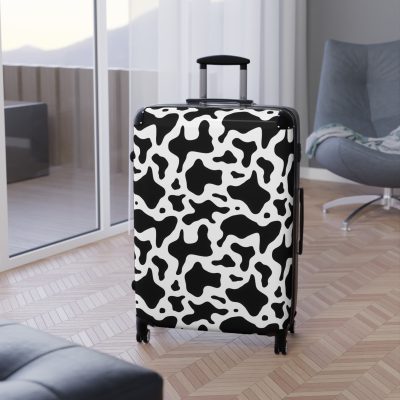 Cow Print Suitcase - A stylish luggage featuring a chic cow print design, perfect for travelers who want to add a touch of luxury to their journeys.