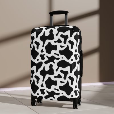 Cow Print Suitcase - A stylish luggage featuring a chic cow print design, perfect for travelers who want to add a touch of luxury to their journeys.