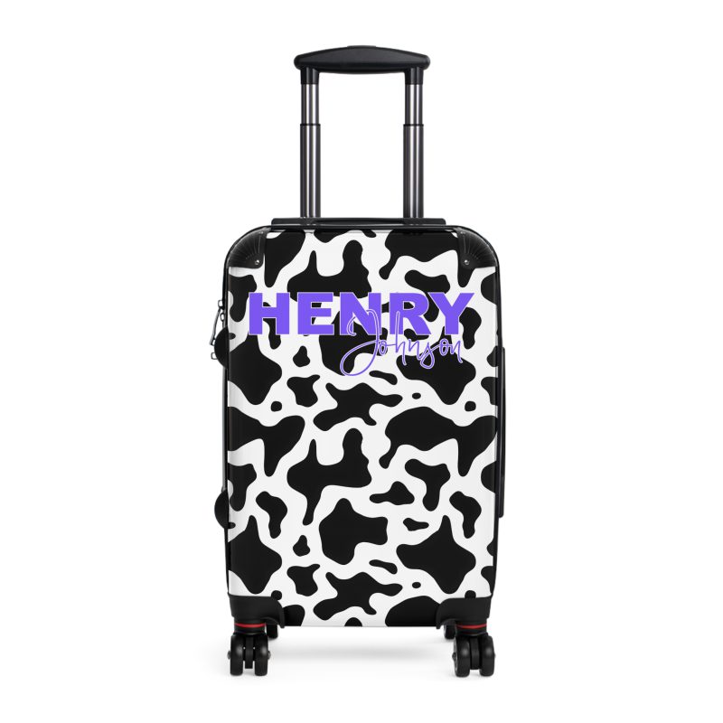 Custom Cow Print Suitcase - A personalized luggage adorned with a unique cow print design, perfect for travelers who want to add a touch of individuality to their journeys.