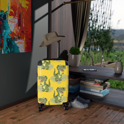 Dinosaur Suitcase - A luggage adorned with a captivating dinosaur-themed design, perfect for young travelers who want to embark on Dinosaur adventures in style.