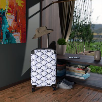 Volleyball Suitcase - A luggage adorned with a sporty volleyball-themed design, perfect for travelers who want to travel in style with their favorite sport.