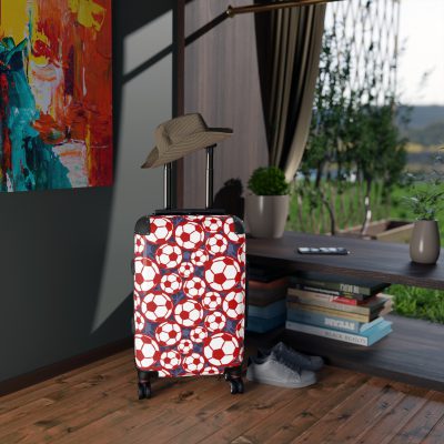 Soccer Suitcase - A luggage adorned with a sporty soccer-themed design, perfect for travelers who want to travel in style with their favorite sport.