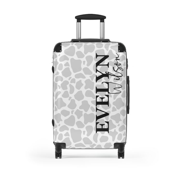 Custom Cow Print Suitcase - A personalized luggage adorned with a unique cow print design, perfect for travelers who want to add a touch of individuality to their journeys.