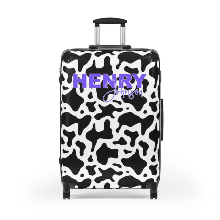 Custom Cow Print Suitcase - A personalized luggage adorned with a unique cow print design, perfect for travelers who want to add a touch of individuality to their journeys.