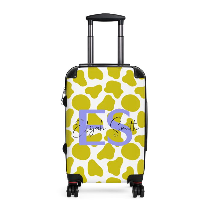 Custom Cow Print Suitcase - A personalized luggage adorned with a unique cow print design, perfect for travelers who want to add a touch of individuality to their journeys.