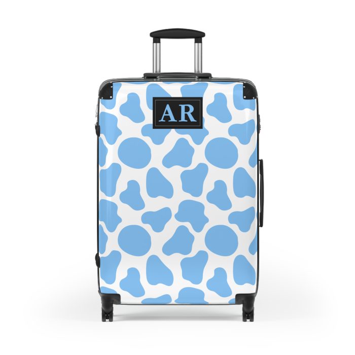 Custom Cow Print Suitcase - A personalized luggage adorned with a unique cow print design, perfect for travelers who want to add a touch of individuality to their journeys.