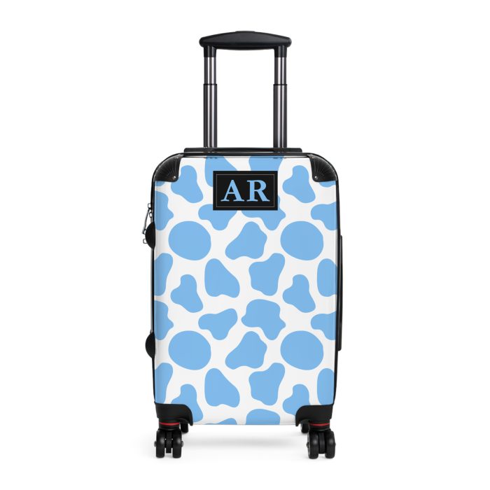 Custom Cow Print Suitcase - A personalized luggage adorned with a unique cow print design, perfect for travelers who want to add a touch of individuality to their journeys.