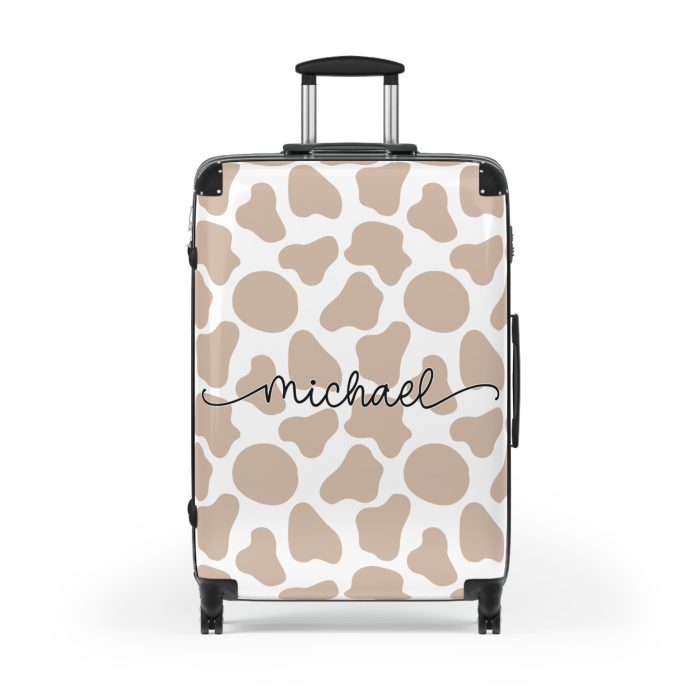 Custom Cow Print Suitcase - A personalized luggage adorned with a unique cow print design, perfect for travelers who want to add a touch of individuality to their journeys.