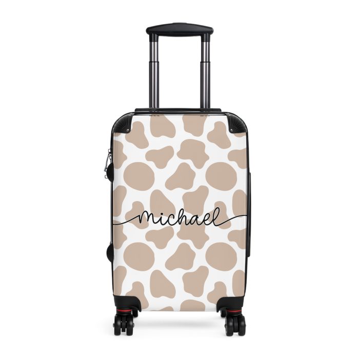 Custom Cow Print Suitcase - A personalized luggage adorned with a unique cow print design, perfect for travelers who want to add a touch of individuality to their journeys.