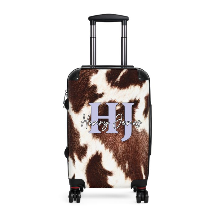 Custom Cowhide Suitcase - A personalized luggage adorned with a unique design, perfect for travelers who want to add a touch of individuality to their journeys.