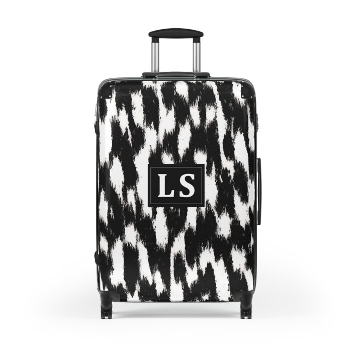 Custom Cowhide Suitcase - A personalized luggage adorned with a unique design, perfect for travelers who want to add a touch of individuality to their journeys.