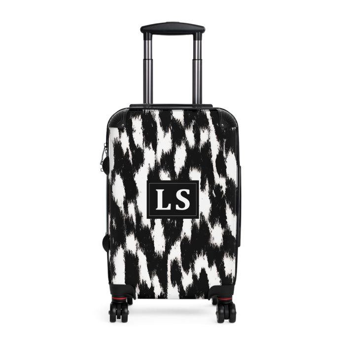 Custom Cowhide Suitcase - A personalized luggage adorned with a unique design, perfect for travelers who want to add a touch of individuality to their journeys.